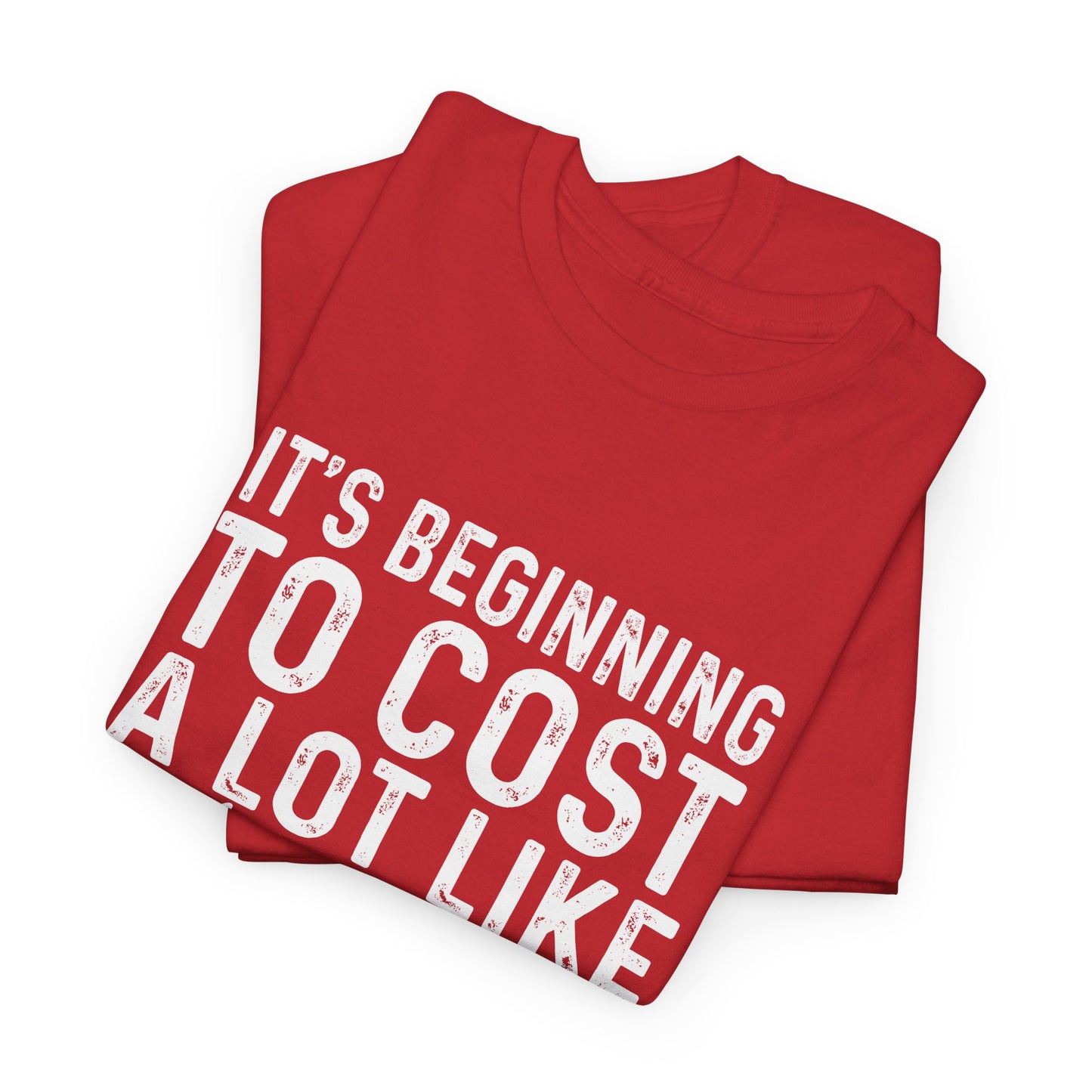 Christmas Humor Tee — "It’s Beginning to Cost a Lot Like Christmas" Red T-Shirt