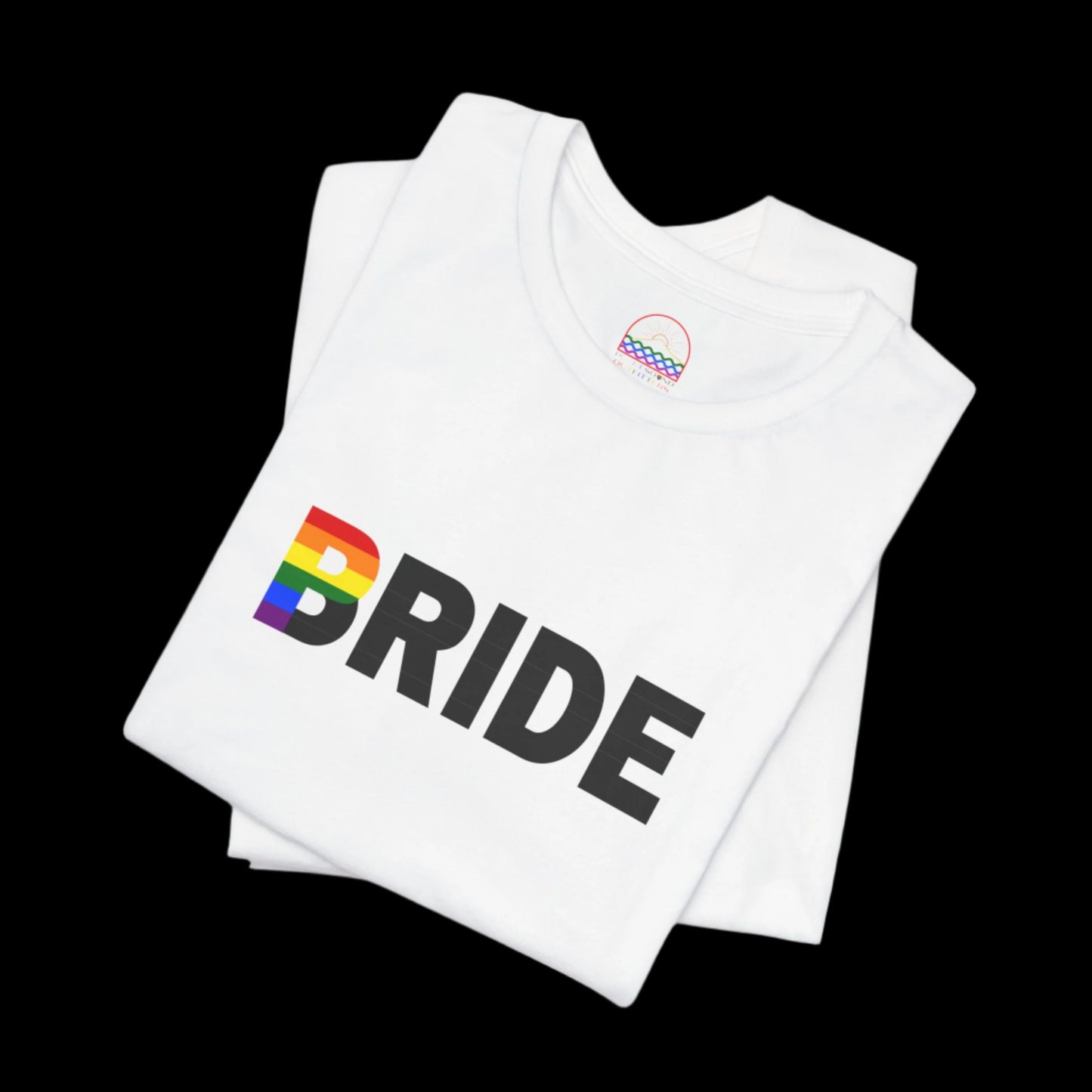 Close-up of 'Bride' rainbow design on white LGBTQ+ wedding T-shirt