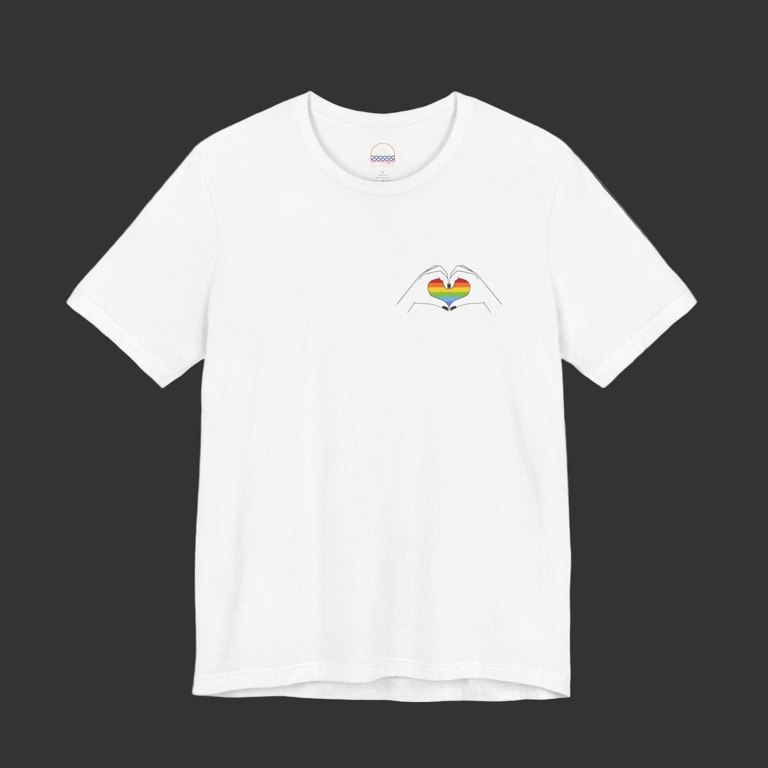 White t-shirt with a rainbow heart design on a black background