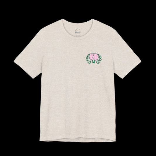Tan pickleball t-shirt with small front chest logo of crossed paddles and green leaves